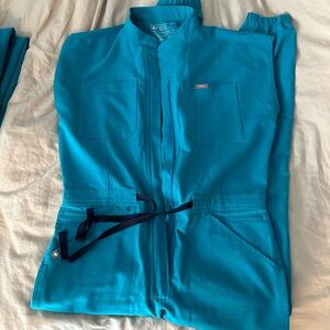 FIGS women’s Rafaela Cargo ScrubJumpsuit in teal